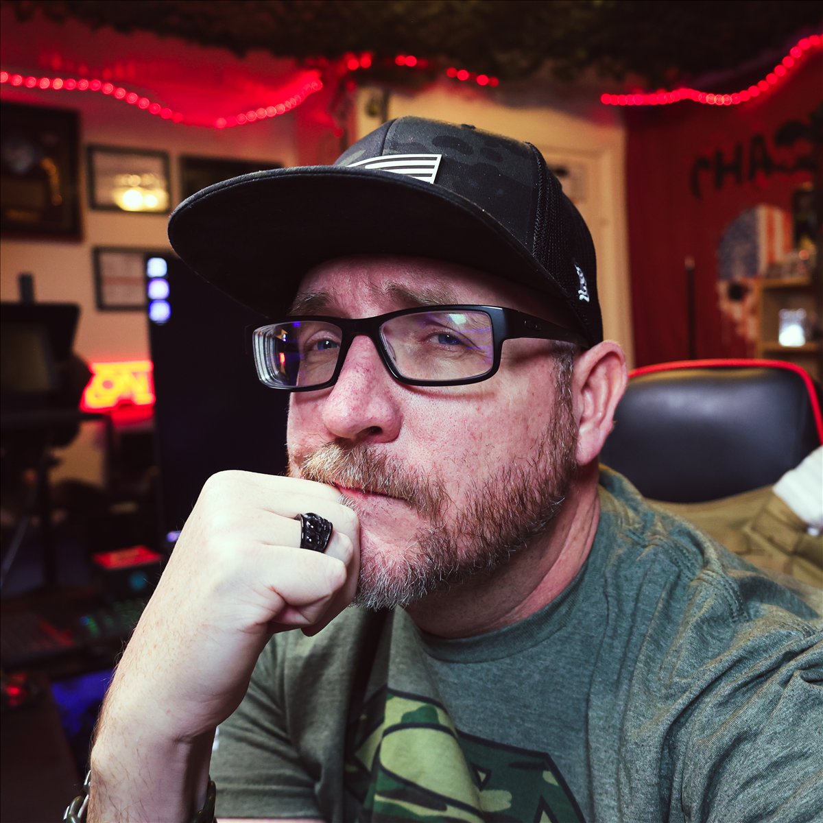 Christopher Chaos in his red-lit studio